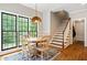 Eat-in kitchen and dining area with large windows and a view to the backyard at 992 Marbury Sw Ct, Marietta, GA 30064