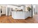 Eat-in kitchen featuring bright white cabinetry, stainless steel appliances, and granite countertops at 992 Marbury Sw Ct, Marietta, GA 30064