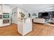 Open kitchen and living room space with granite countertops and stainless steel appliances at 992 Marbury Sw Ct, Marietta, GA 30064