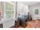 Bright laundry room with modern washer and dryer, utility sink, and ample storage space at 992 Marbury Sw Ct, Marietta, GA 30064