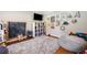 Cozy playroom with a large rug, chalkboard, beanbag and built-in shelving for books and toys at 992 Marbury Sw Ct, Marietta, GA 30064