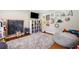Cozy playroom with colorful decor, a chalkboard, shelving, and soft rug and beanbag at 992 Marbury Sw Ct, Marietta, GA 30064