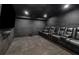 Home theater features comfortable reclining seats, a large screen TV and custom lighting at 992 Marbury Sw Ct, Marietta, GA 30064