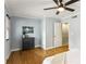Light-filled bedroom with hardwood floors, modern decor, and a closet for storage at 1002 Defoors Nw Lndg, Atlanta, GA 30318