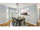 Dining area with table and bay window next to the kitchen at 1002 Defoors Nw Lndg, Atlanta, GA 30318