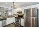 Modern kitchen with stainless steel appliances and white cabinetry at 1002 Defoors Nw Lndg, Atlanta, GA 30318