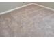 Close up of bedroom with plush carpeting and white trim at 948 Regency Dr, Lawrenceville, GA 30044