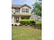 Charming two-story home with a brick and siding exterior and a well-maintained front yard at 948 Regency Dr, Lawrenceville, GA 30044