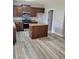 Spacious kitchen featuring an island, stainless steel appliances, and dark wood cabinets at 948 Regency Dr, Lawrenceville, GA 30044