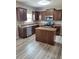 Kitchen featuring stainless steel appliances, granite countertops, and wood cabinets at 948 Regency Dr, Lawrenceville, GA 30044
