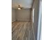 Bright living room with wood floors, neutral walls, and large windows providing plenty of natural light at 948 Regency Dr, Lawrenceville, GA 30044