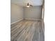 Spacious living room featuring neutral walls, wood floors, and abundant natural light at 948 Regency Dr, Lawrenceville, GA 30044