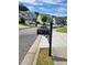 Street view featuring mailboxes, houses, and parked cars in the neighborhood at 948 Regency Dr, Lawrenceville, GA 30044