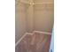 Carpeted walk-in closet featuring sturdy wire shelving and ample space for storage and organization at 948 Regency Dr, Lawrenceville, GA 30044