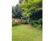 Fenced backyard with mature trees at 2977 Lowe Trail Ne Trl, Marietta, GA 30066