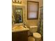 Bathroom with toilet, sink and mirror at 2977 Lowe Trail Ne Trl, Marietta, GA 30066