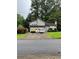 Two-story home with neutral siding, two-car garage, and an ample front yard at 2977 Lowe Trail Ne Trl, Marietta, GA 30066