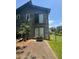 Exterior of home with sliding doors and a yard at 2977 Lowe Trail Ne Trl, Marietta, GA 30066