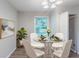 Cozy dining area with a glass table and modern chairs, great for Gathering dinners at 4230 Cheryl Ann Ct, Stone Mountain, GA 30083