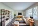 Bright living room with modern decor, stylish rug, and large windows at 4230 Cheryl Ann Ct, Stone Mountain, GA 30083