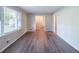 Inviting living room featuring gorgeous hardwood floors and ample natural light at 4230 Cheryl Ann Ct, Stone Mountain, GA 30083