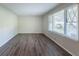 Inviting living room featuring gorgeous hardwood floors, ample natural light, and a comfortable ambiance at 4230 Cheryl Ann Ct, Stone Mountain, GA 30083