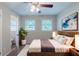 Serene main bedroom with modern decor, ensuite access, and a relaxing atmosphere at 4230 Cheryl Ann Ct, Stone Mountain, GA 30083