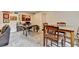 Finished basement with multiple seating areas, a dining table, and a work from home area at 5105 Vernon Oaks Dr, Dunwoody, GA 30338