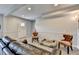 Finished basement with two seating areas including space for the dog and access to the outside at 5105 Vernon Oaks Dr, Dunwoody, GA 30338