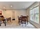 This basement features a work-from-home area and dining area with natural light at 5105 Vernon Oaks Dr, Dunwoody, GA 30338