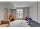 Carpeted basement with large windows for natural light, perfect for a home gym or playroom at 5105 Vernon Oaks Dr, Dunwoody, GA 30338