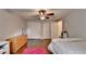 A minimalist bedroom with hardwood floors, pink rug, and 2 large closets at 5105 Vernon Oaks Dr, Dunwoody, GA 30338
