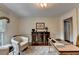Home office features decorative accents, natural light, and neutral color scheme, creating a serene workspace at 5105 Vernon Oaks Dr, Dunwoody, GA 30338