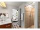Modern bathroom with shower, stylish vanity, and a large doorway view to the bedroom at 616 Angier Ne Ave # 4, Atlanta, GA 30308