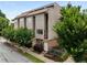 Attractive three-story townhome with a modern design and a combination of brick and gray stucco facade at 616 Angier Ne Ave # 4, Atlanta, GA 30308
