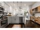 Modern kitchen with stainless steel appliances, gray cabinets, and hardwood floors at 616 Angier Ne Ave # 4, Atlanta, GA 30308