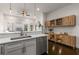 Modern kitchen featuring stainless steel appliances, light countertops, and stylish wooden cabinetry at 616 Angier Ne Ave # 4, Atlanta, GA 30308