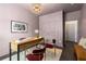 Well-lit home office featuring neutral walls, hardwood floors, and a closet for ample storage at 616 Angier Ne Ave # 4, Atlanta, GA 30308