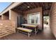 View of an outside patio with picnic-style seating and an outdoor closet for extra storage at 616 Angier Ne Ave # 4, Atlanta, GA 30308