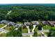Aerial view featuring suburban homes in a wooded area at 650 Chestatee Creek Nw Dr, Acworth, GA 30101