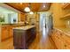 Well-equipped kitchen with granite countertops, custom cabinets, stainless steel appliances, and a center island at 650 Chestatee Creek Nw Dr, Acworth, GA 30101