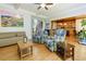 Spacious living room with hardwood floors that opens to the kitchen and features a neutral color palette at 650 Chestatee Creek Nw Dr, Acworth, GA 30101