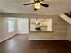 Spacious living room features hardwood floors and kitchen access at 1343 Old Coach Sw Rd, Marietta, GA 30008