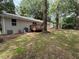 View of backyard featuring a small wood deck and some grass at 2943 Westbury Dr, Decatur, GA 30033