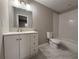Bright bathroom features a vanity, mirror, and tiled bathtub and shower combination at 2943 Westbury Dr, Decatur, GA 30033