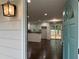 Inviting open-concept living space with hardwood floors flowing into the bright and modern kitchen at 2943 Westbury Dr, Decatur, GA 30033