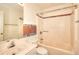 Cozy bathroom with white vanity and mosaic tile accents around the tub at 2983 Trotters View Way, Snellville, GA 30039