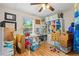 Craft room with organized storage, natural light, and a ceiling fan, perfect for creative projects at 778 Mclendon Dr, Decatur, GA 30079