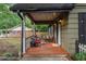 Inviting covered front porch with seating, perfect for relaxing outdoors at 778 Mclendon Dr, Decatur, GA 30079