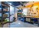 Well-organized basement with shelving, work bench, and plenty of storage space at 104 Powell Cv, Decatur, GA 30030